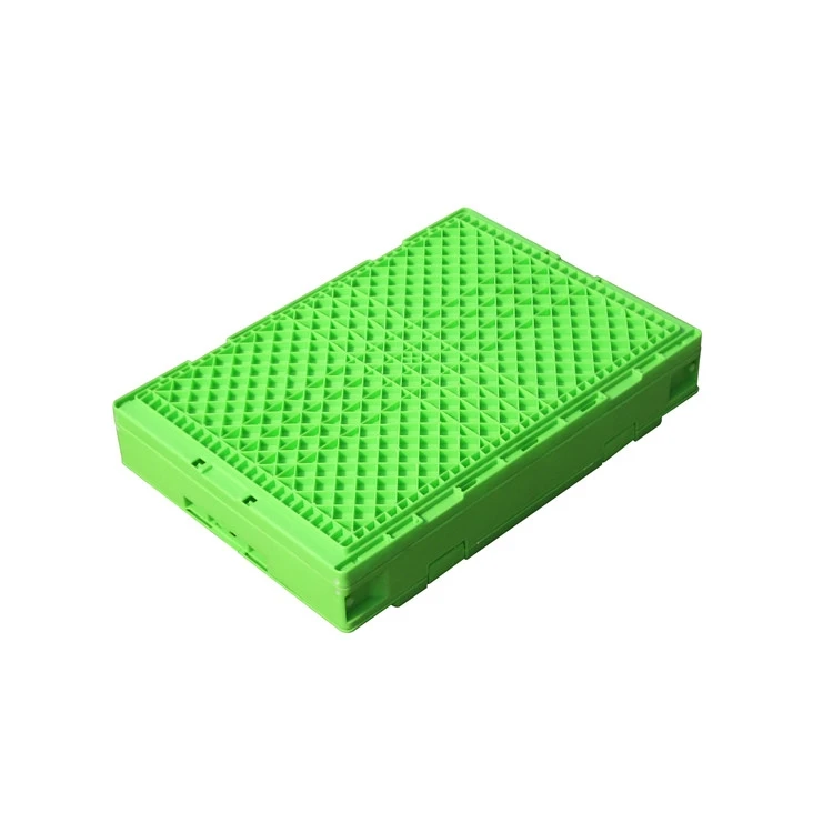 Bottom view of a folded green plastic crate Bottom view of a folded green plastic crate